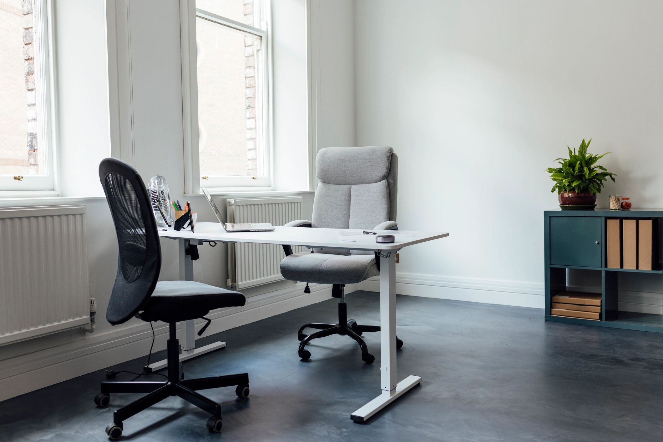 Office workspace representing issue definition and research planning
