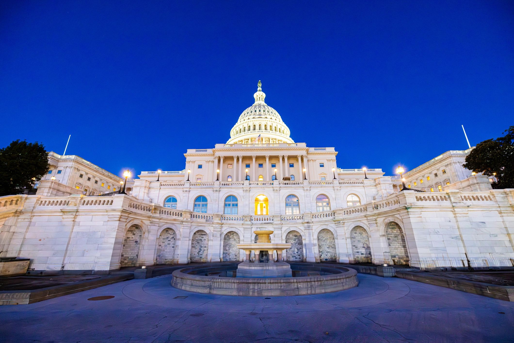 US Capitol Building illuminated at twilight in Washington, DC
