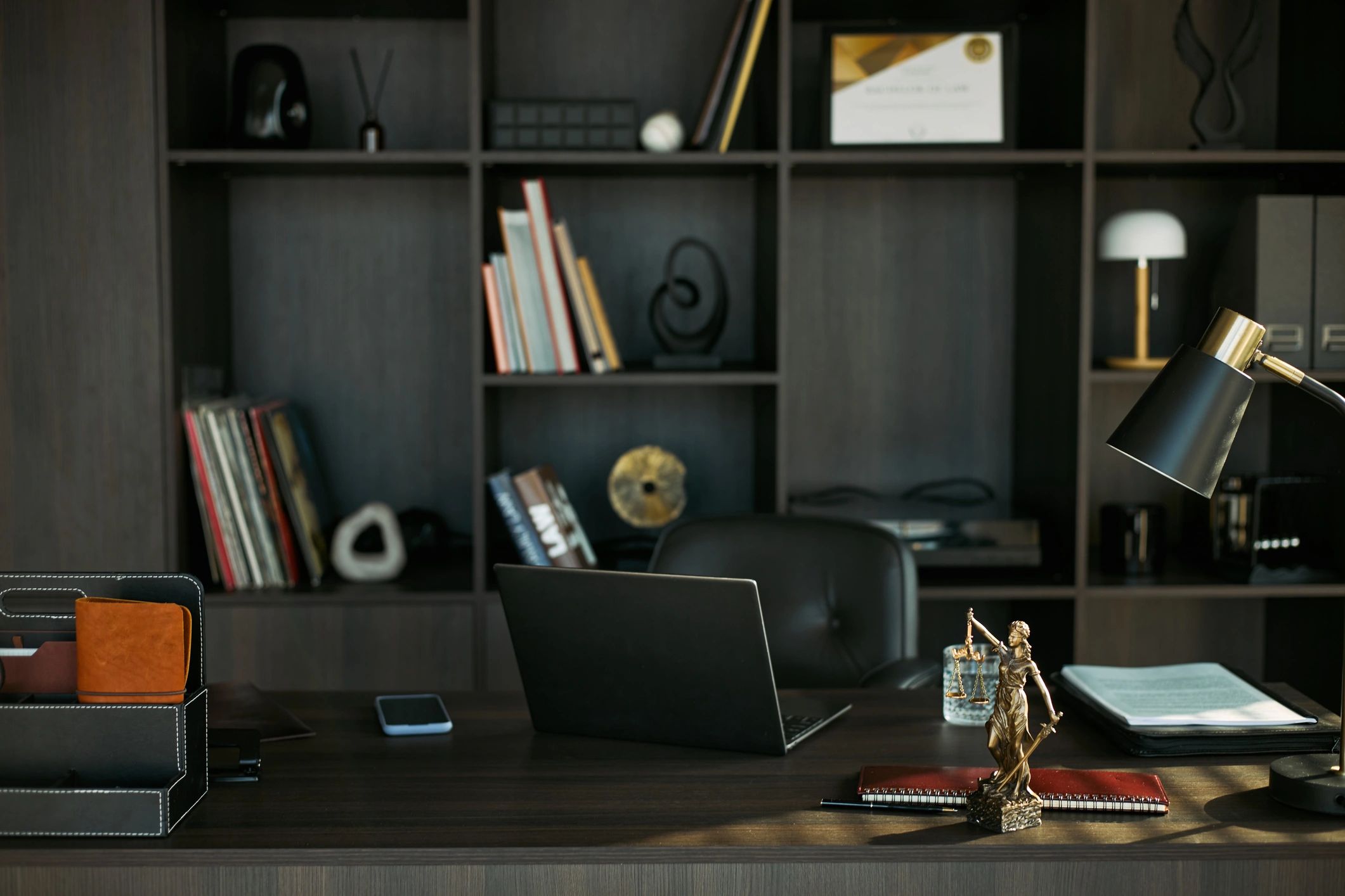 Desk with legal files and official-looking documents representing research and review